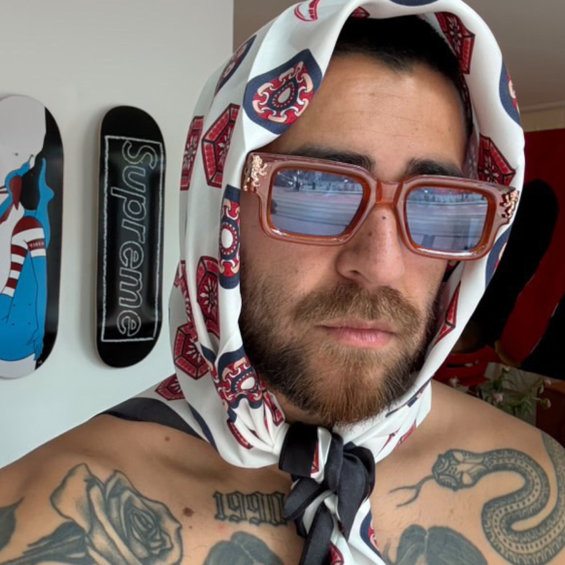 elliot pattinama from holland the netherlands model babushka eyewear beard supreme skateboard sky dune lion's tale studios pure silk straatmode man zonnebril heren hoofddoek stijl statement zonnebril urban fashion tattoo stijl streetwear look zomer outfit mode accessoires opvallende bril luxe streetwear mannen fashion retro zonnebril heren stijl modetrend zomer streetstyle man moderne zonnebril fashion statement edgy kleding unieke look