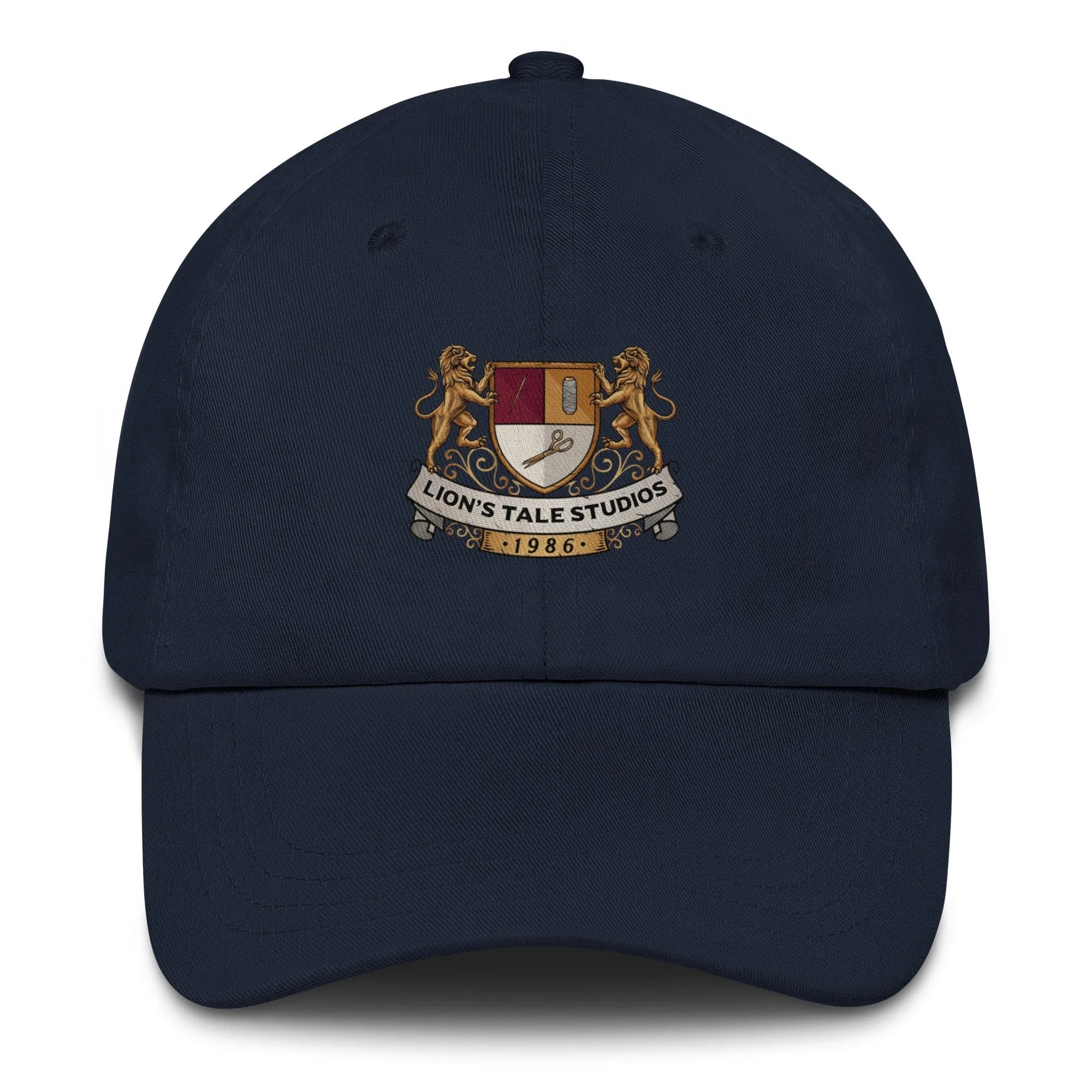 Papa hat with LTS OG print featuring Lion's Tale Studios emblem in gold and red on a navy blue background.