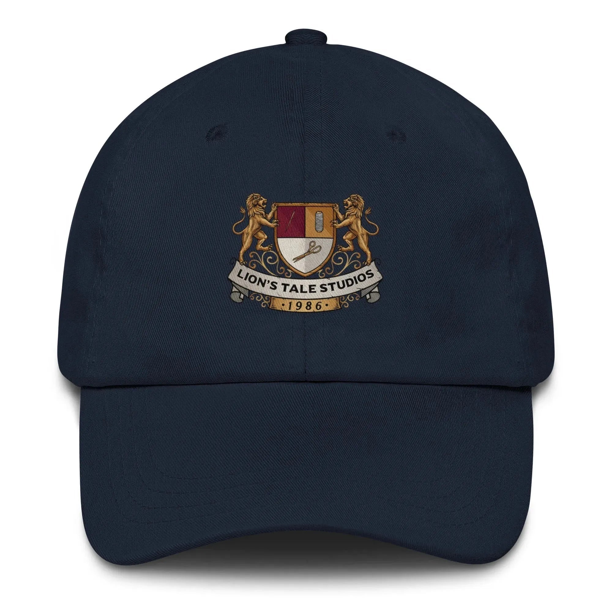 Papa hat with LTS OG print featuring Lion's Tale Studios emblem in gold and red on a navy blue background.