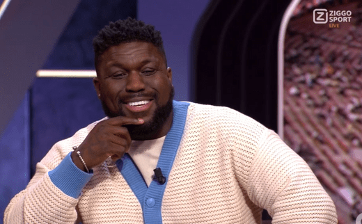 Blog #35 - Royston Drenthe wearing our 'Anti-Logo Knitted Cardigan' on Ziggo Sport Live! - Lion's Tale Studios