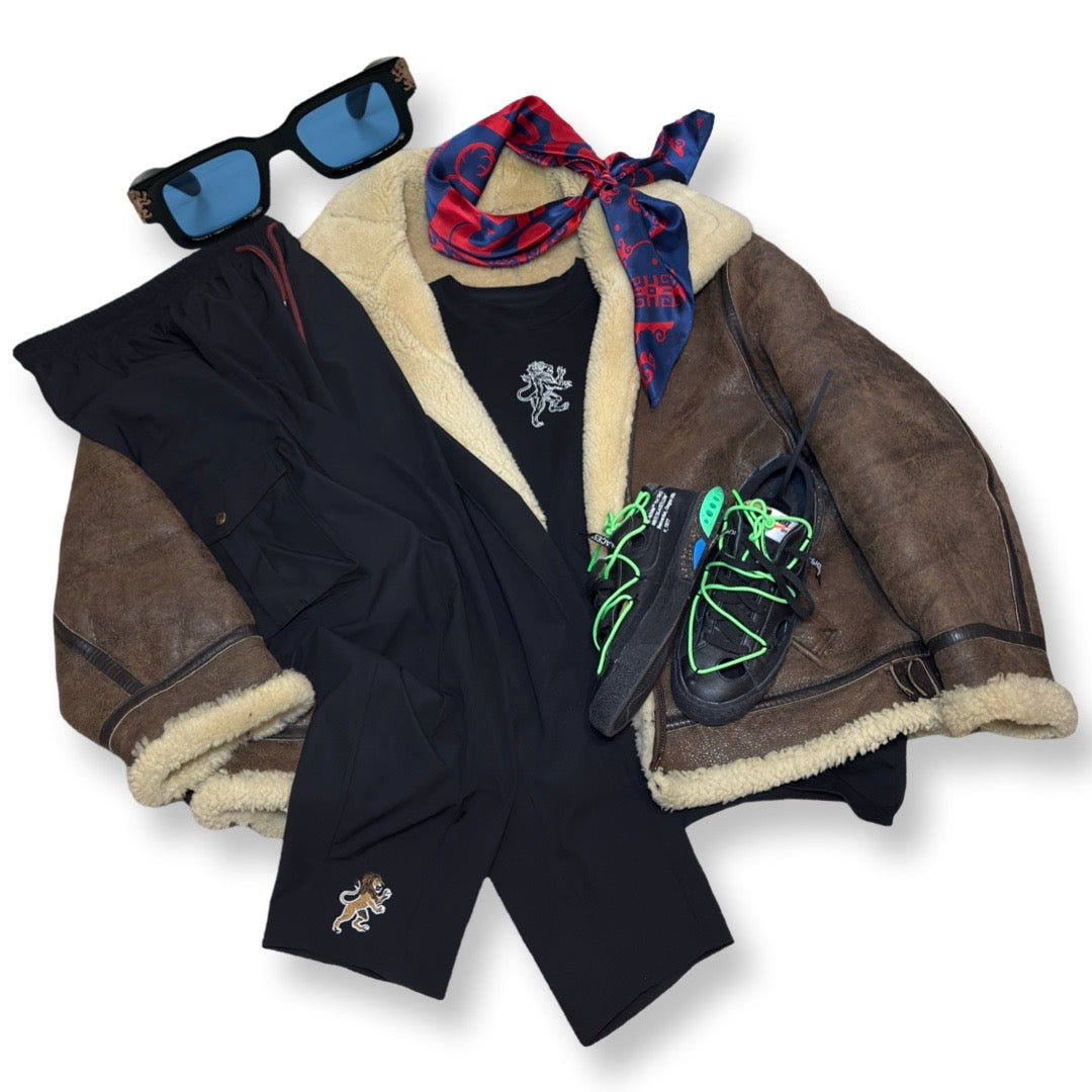 Outfit Post Menswear Lion's Tale Studios Style inspo Fashion Style Inspiration Aime Leon Dore Kazuku Jogging Suit Gilet Army Inpired Sneakers Virgil Abloh Maxime Patty Patawala Silk Cardigan Eyewear Lion Singa Mini Bag Leather All Black Kazuku Mason Garments Off White Socks Lammy Tie Batik Gucci Bordeaux Nike Roaring Lion's Eyewear
